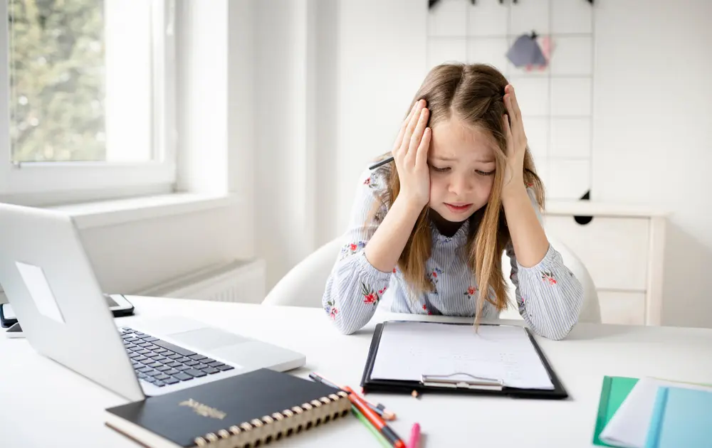 Child having trouble with homework.